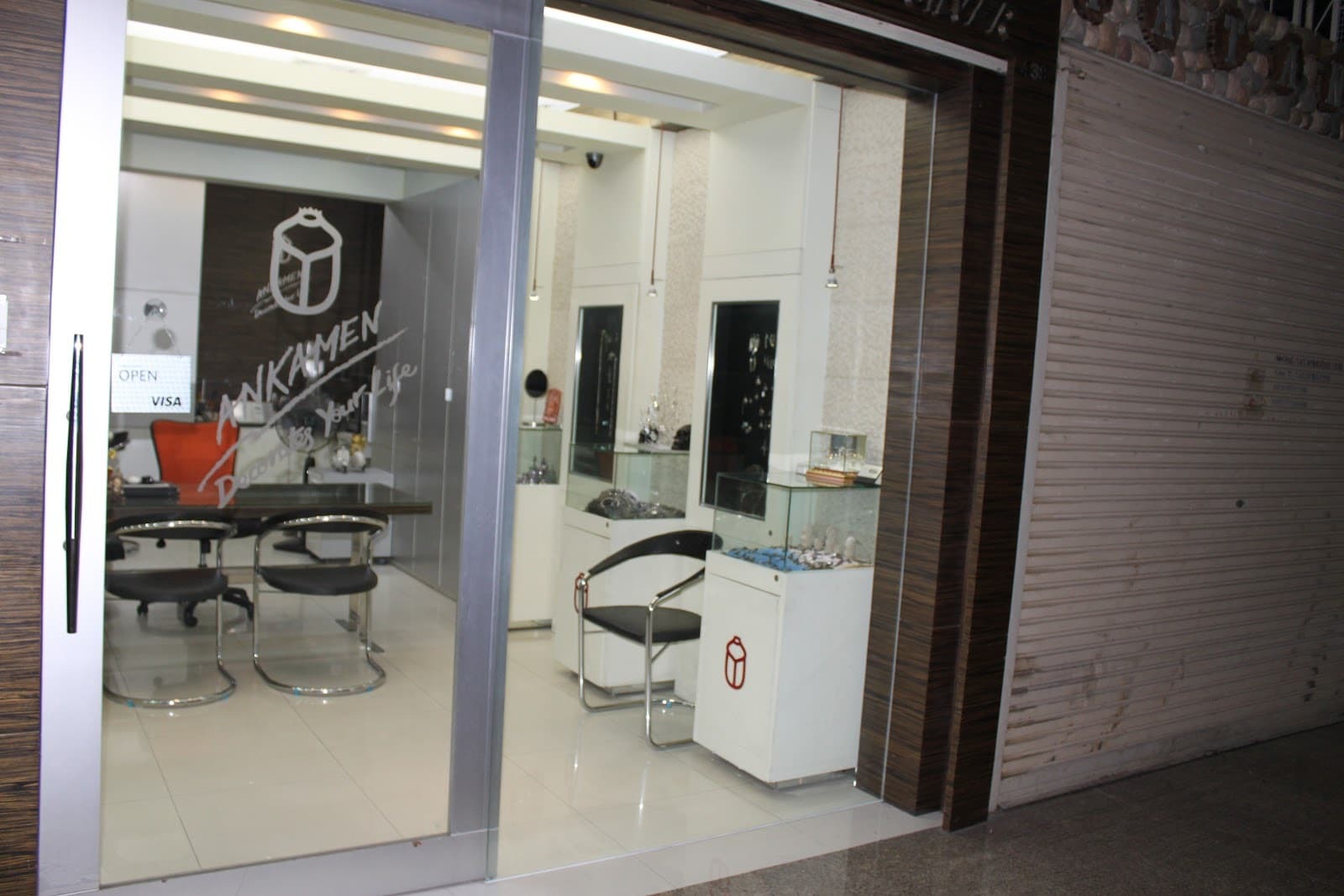 The Ankamen Silver showroom at Palladium, with the scarab mark on the glass.